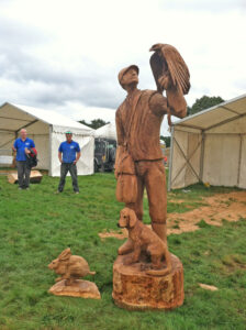 Man with bird carving